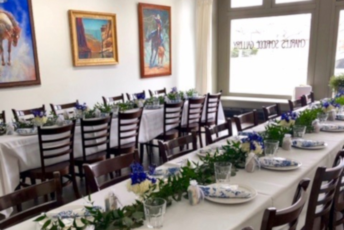 Two rows of tables with floral decorations